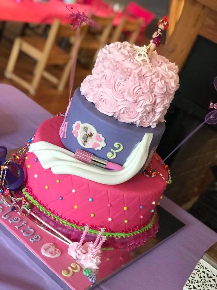 Detailed pink and purple birthday cake made by Lollipop Garden