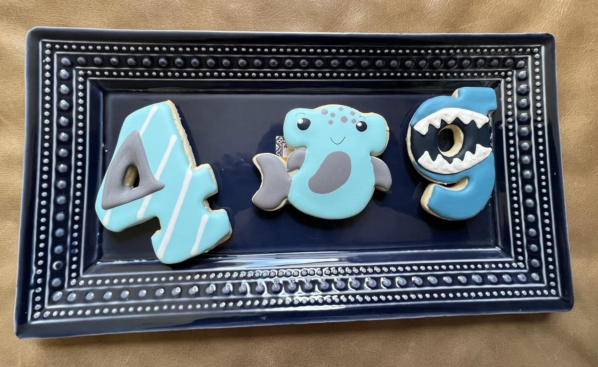 Shark themed birthday cookies made by Lollipop Garden