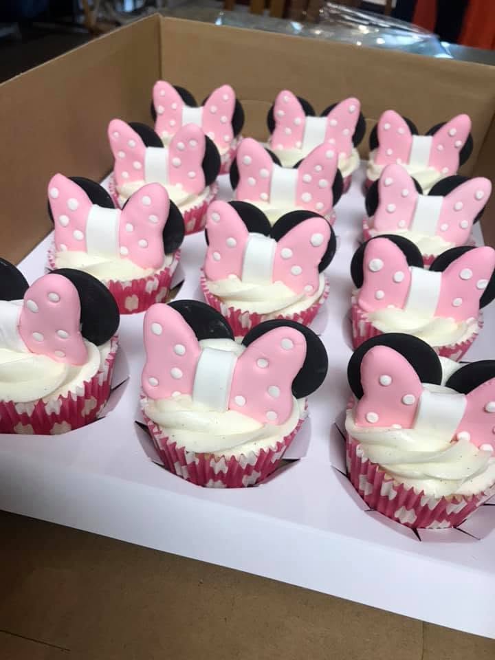 Pink Minnie Mouse themed cupcakes made by Lollipop Garden